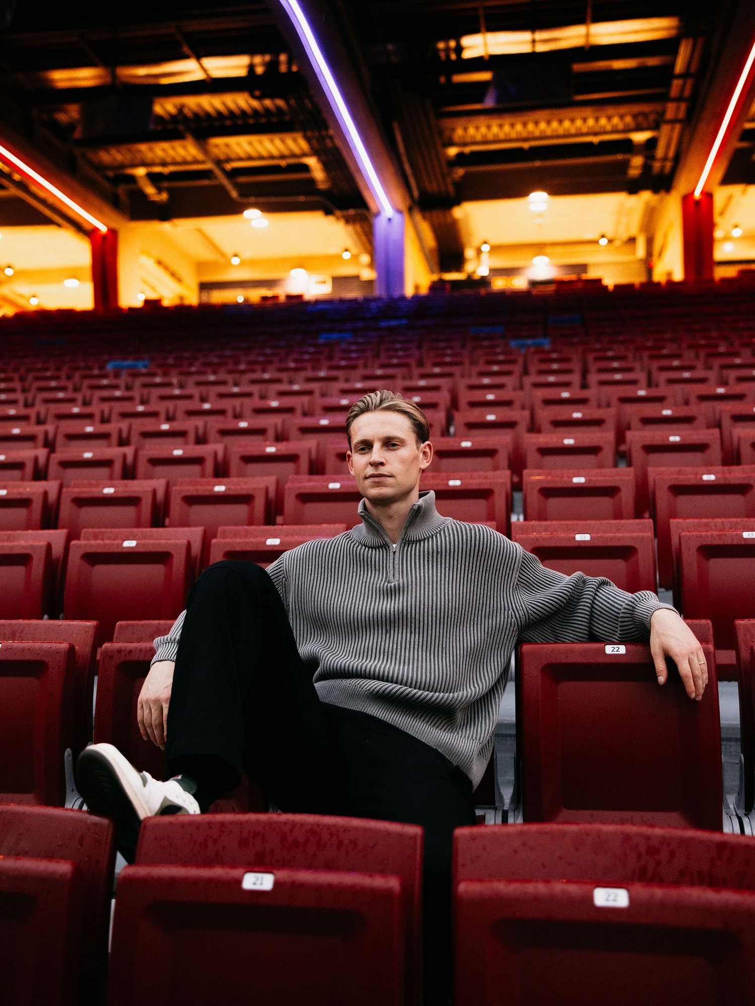 Frenkie de Jong sitting in the stands of FC Barcelona
