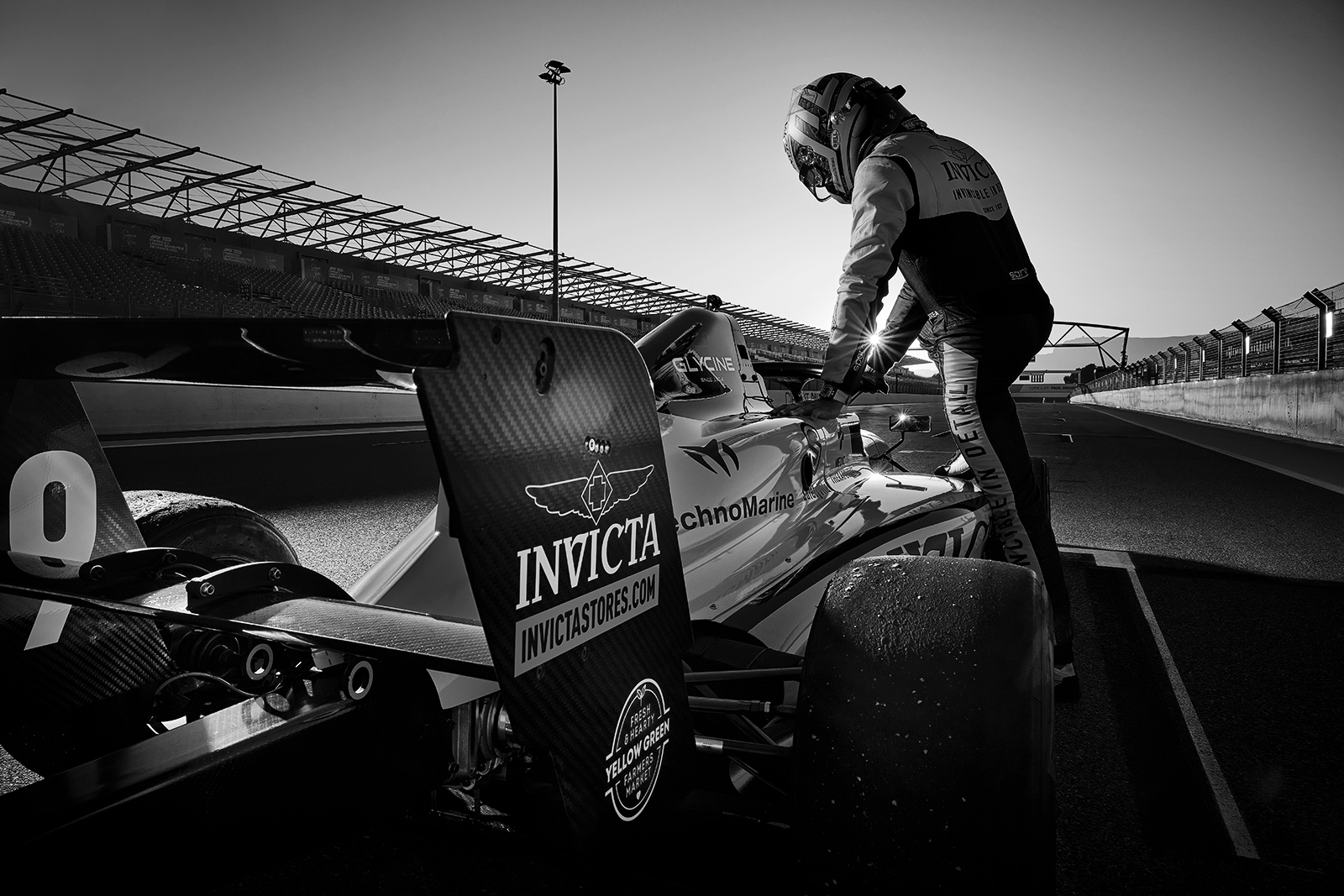 Juan Manuel Correa steps into his racing car