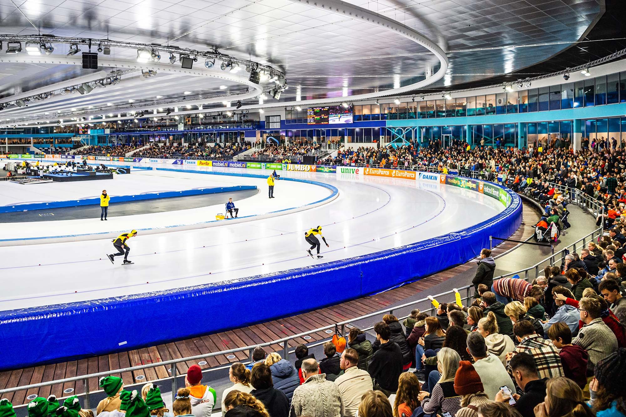 Ice skaters Team Jumbo-Visma in action in a packed Thialf